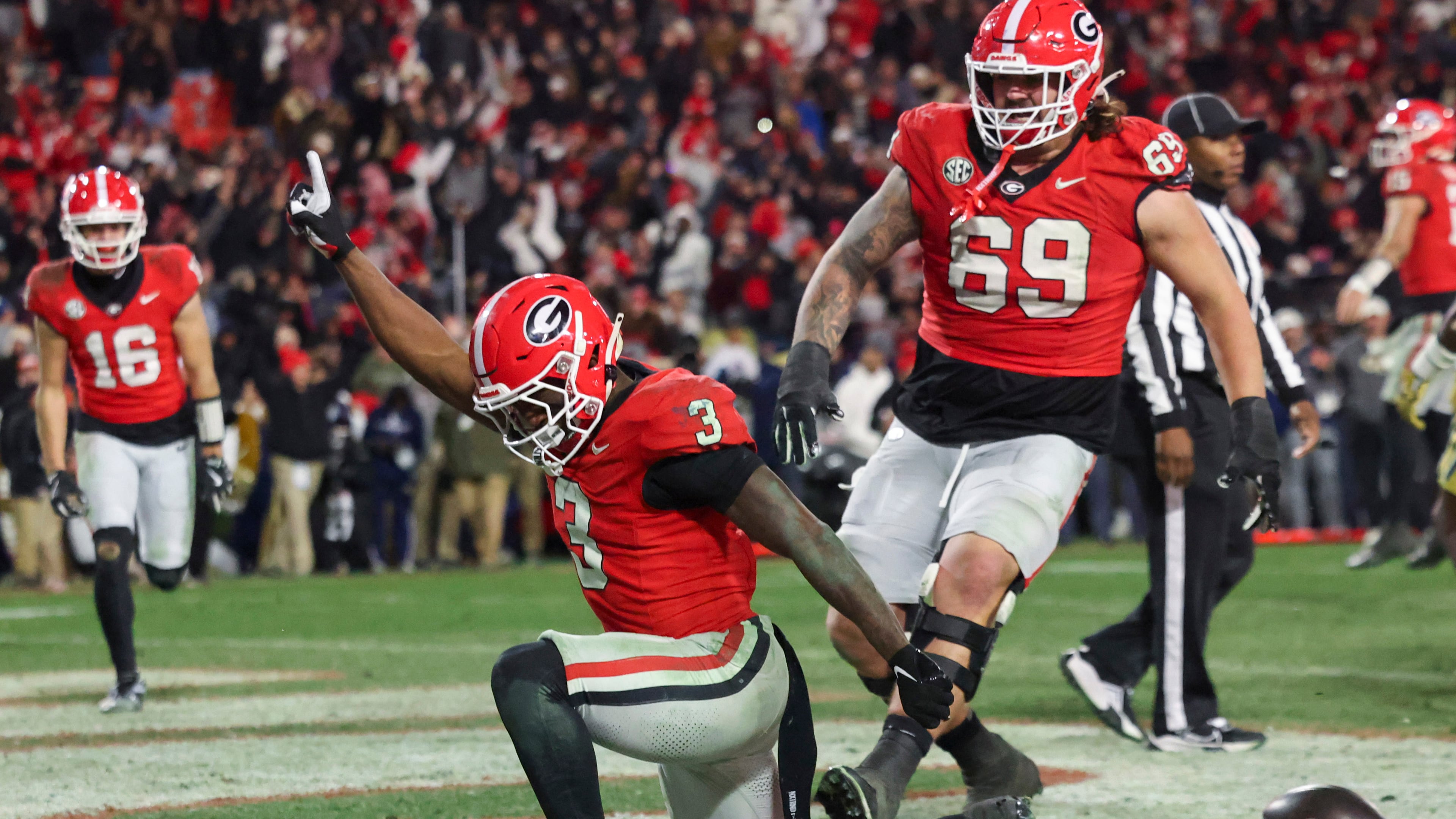 Georgia running back Nate Frazier, celebrating the game-winning 2-point conversion to beat Georgia Tech on Nov. 29, will likely be counted on as the team's top rusher in 2025. (Jason Getz/AJC 2025)