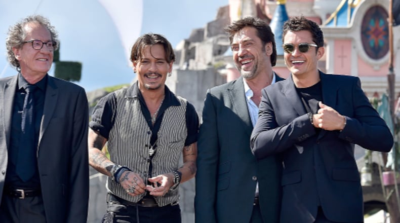 Actors, from left, Geoffrey Rush, Johnny Depp, Javier Bardem and Orlando Bloom attend the European premiere of Disney's ‘Pirates of the Caribbean: Dead Men Tell No Tales.’  Depp and Bardem have both signed on to play monsters in Universal’s new ‘Dark Universe’ film series, a reboot of sorts of classic monster movies.