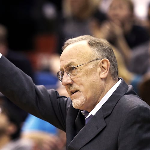 FILE - Minnesota Timberwolves head coach Rick Adelman celebrates a defensive rebound by Ricky Rubio in the second half of an NBA basketball game against Oklahoma City Thunder, March 29, 2013 ,in Minneapolis. (AP Photo/Jim Mone, File)