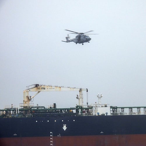 In this handout photo provided by the French Army, an NH90 helicopter intercepts an oil tanker that was traveling from Russia under international sanctions, on the Atlantic Sea, Sunday, May 31, 2026. (French Army via AP)