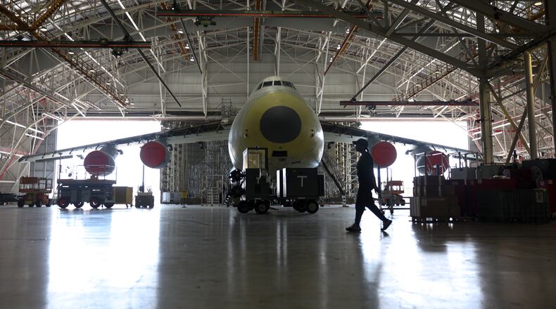A C-5 aircraft is under repair at a hangar in Robins Air Force Base in Houston County on Aug. 21, 2026. (Arvin Temkar/AJC)