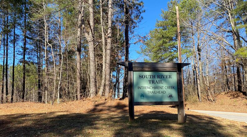 A sign outside the existing trailhead for the South River Trail at Intrenchment Creek Park, near Bouldercrest Road in southwest DeKalb County. TYLER ESTEP / TYLER.ESTEP@AJC.COM