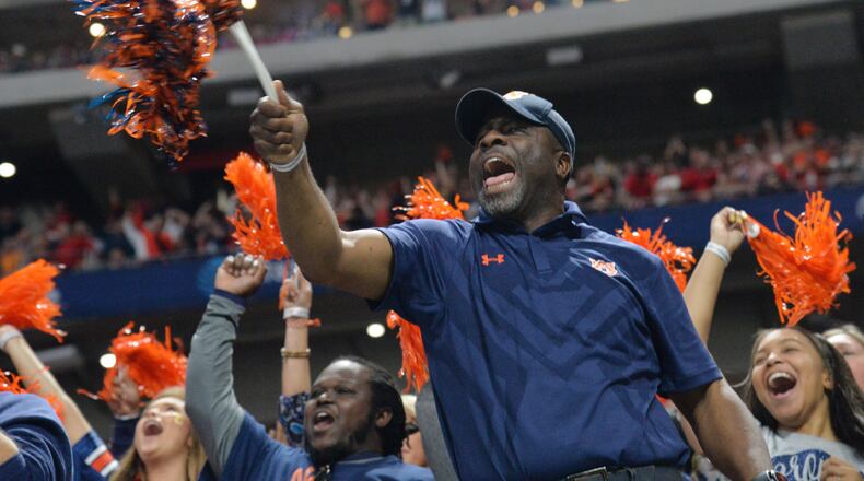 December 2, 2017 Atlanta: Auburn Tigers fans cheer during the first half of the SEC Football Championship at Mercedes-Benz Stadium, December 2, 2017, in Atlanta.  Hyosub Shin / hshin@ajc.com