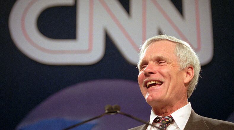FILE - Ted Turner speaks during the CNN World Report Contributors banquet in Atlanta on May 4, 1995. (AP Photo/John Bazemore, File)