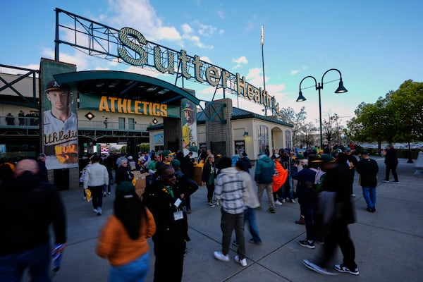 Fans arrive at Sutter Health Park for a baseball game between the Athletics and the Chicago Cubs, Monday, March 31, 2025, in West Sacramento, Calif. (AP Photo/Godofredo A. Vásquez)