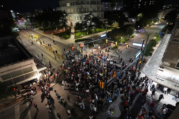 Anti ICE protesters gather in downtown San Antonio, Wednesday, June 11, 2025. (AP Photo/Eric Gay)