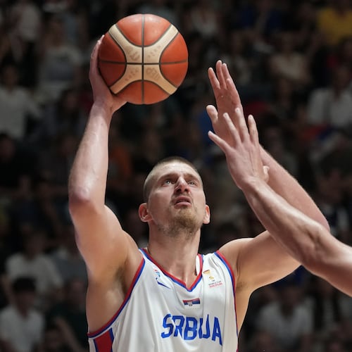 Serbia's Nikola Jokic tries to score as Bosnia's Luka Garza blocks him during their FIBA Basketball World Cup 2027 European qualifiers match between Serbia and Bosnia, in Belgrade, Serbia, Monday, July 6, 2026. (AP Photo/Darko Vojinovic)