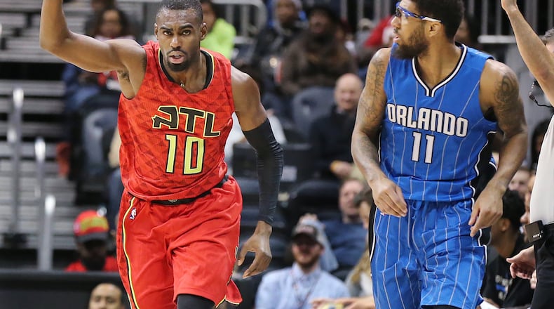 Hawks’ Tim Hardaway Jr. reacts to hitting a 3-pointer against Magic Devyn Marble during the MLK Day basketball game on Monday, Jan. 18, 2016, in Atlanta. The Hawks rolled to a 98-81 victory over the Magic. Curtis Compton / ccompton@ajc.com