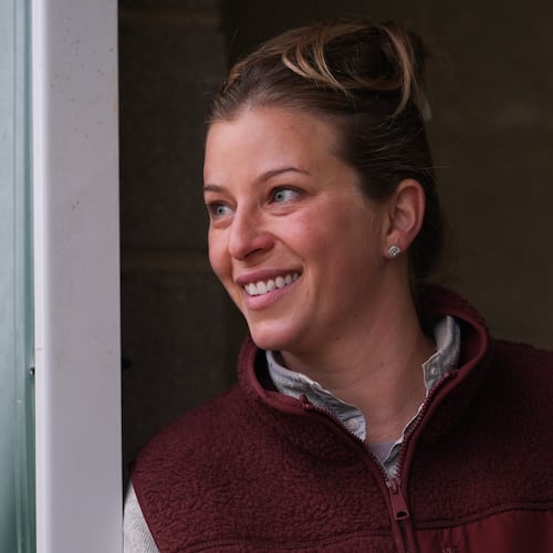 Trainer Brittany Russell talks to people in her barn ahead of the 102nd running of the Black-Eyed Susan horse race, Friday, May 15, 2026, at Laurel Park in Laurel, Md. (AP Photo/Julia Demaree Nikhinson)