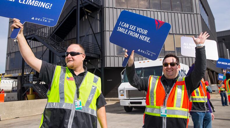 02/1/2019 -- Atlanta, Georgia -- Delta Air Lines employees welcome passengers from a Los Angeles flight to Atlanta at Hartsfield Jackson Airport in Atlanta, Friday, February 1, 2019. (ALYSSA POINTER/ALYSSA.POINTER@AJC.COM)