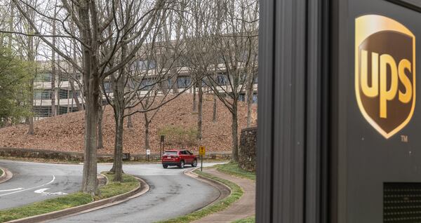 Cars arrive at 55 Glenlake Parkway NE, in Sandy Springs where office workers at UPS streamed back into work on Monday, March, 4, 2024 the first day a new policy requiring them to come into work in person five days a week took effect. The new policy, announced in January, (John Spink / John.Spink@ajc.com)


