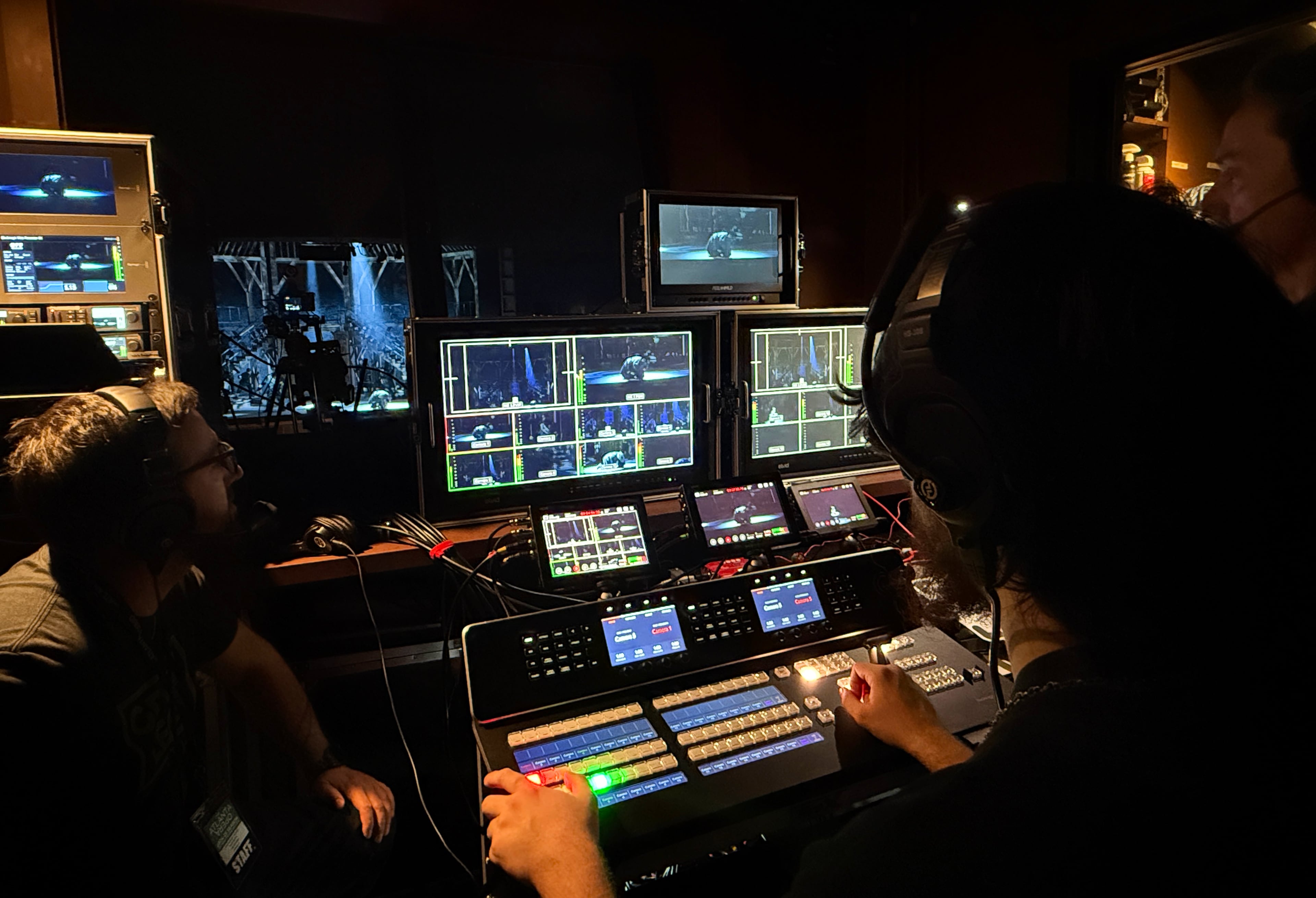 Felipe Barral inside the Atlanta Opera Film Studio's mobile production command center set up in a booth at the back of the Cobb Energy Performing Arts Centre during a rehearsal of "Macbeth" last February. (Danielle Charbonneau/AJC)