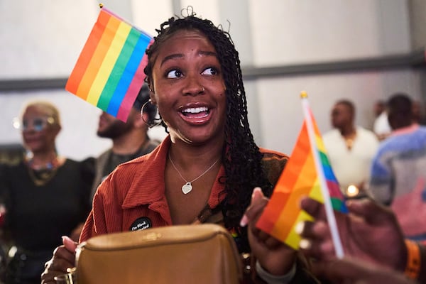 Troisha Busano, of Washington, attends the opening gala of DC Black Pride with her brother and sister, Friday, May 23, 2025, at the Capitol Hilton in Washington. (AP Photo/Jacquelyn Martin)