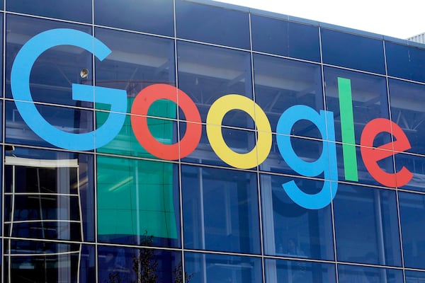 FILE - A sign is displayed on a Google building at their campus in Mountain View, Calif., Sept. 24, 2019. (AP Photo/Jeff Chiu, File)