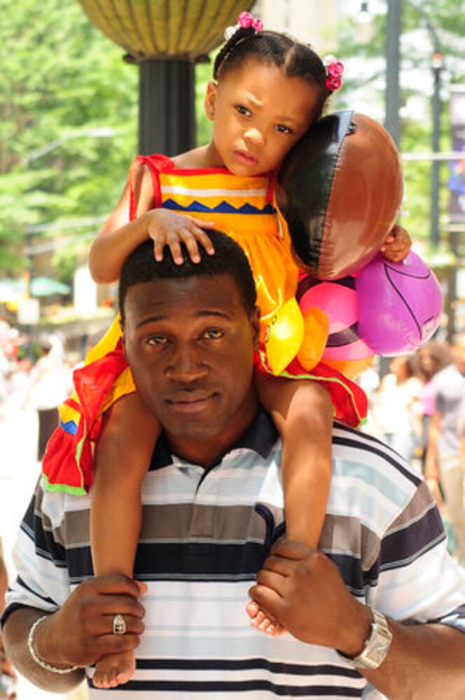 Colorful Caribbean Festival parade dazzles the day