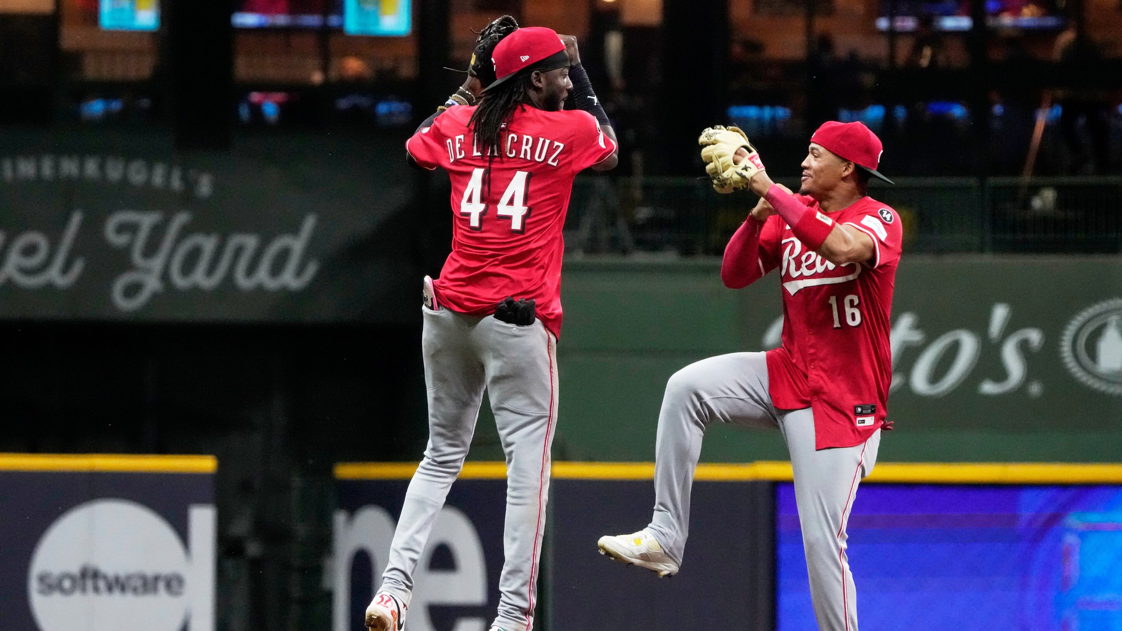 Cincinnati Reds' Elly De La Cruz and Noelvi Marte celebrate after a baseball game against the Milwaukee Brewers Friday, Sept. 26, 2025, in Milwaukee. (AP Photo/Morry Gash)