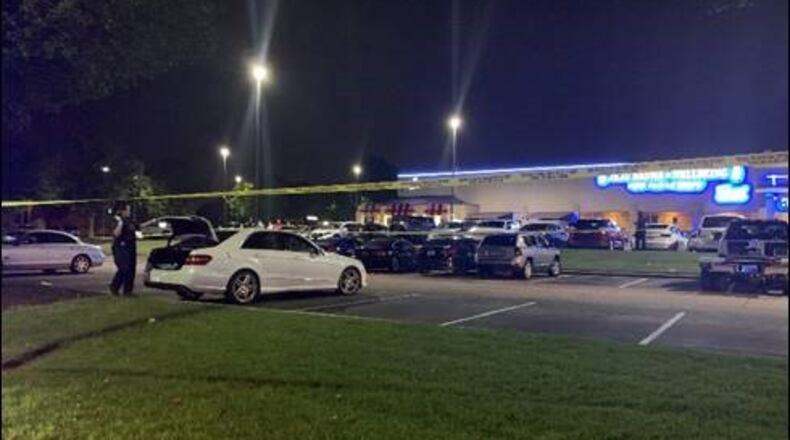 A seventh suspect was arrested Wednesday after a body was found inside the trunk of a vehicle in the parking lot of a Gwinnett County shopping center last month.