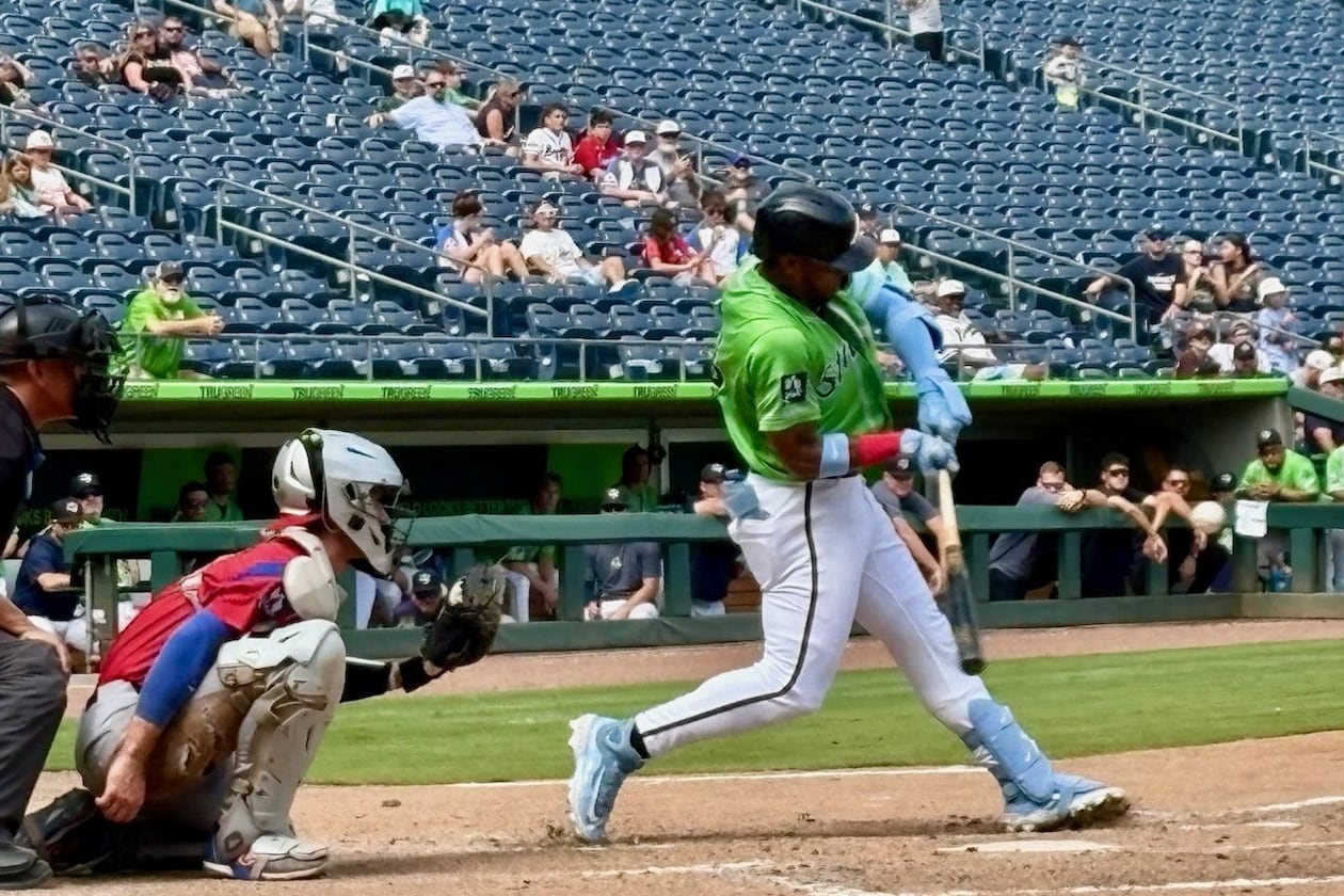 Braves right fielder Ronald Acuña Jr. takes a swing during an at-bat in a Gwinnett Stripers minor-league game at Gwinnett Field in Lawrenceville July 25, 2026. Acuña was with the Stripers on a rehab assignment for a hamstring strain. (Ken Sugiura/AJC)