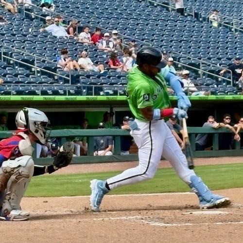 Braves right fielder Ronald Acuña Jr. takes a swing during an at-bat in a Gwinnett Stripers minor-league game at Gwinnett Field in Lawrenceville July 25, 2026. Acuña was with the Stripers on a rehab assignment for a hamstring strain. (Ken Sugiura/AJC)
