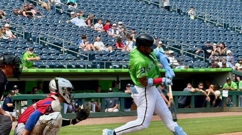 Braves right fielder Ronald Acuña Jr. takes a swing during an at-bat in a Gwinnett Stripers minor-league game at Gwinnett Field in Lawrenceville July 25, 2026. Acuña was with the Stripers on a rehab assignment for a hamstring strain. (Ken Sugiura/AJC)