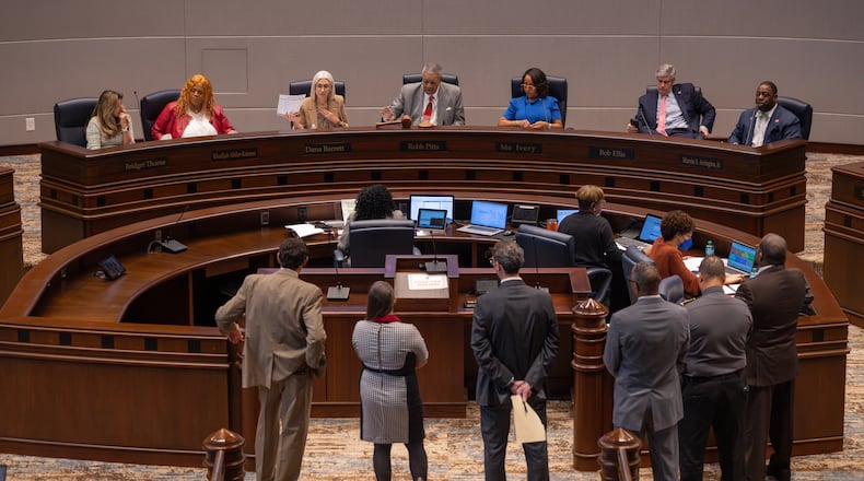 The Fulton County Board of Commissioners — pictured in March debating a proposal to lower the Fulton County Jai population — passed legislation Wednesday that changes the way the counjty's budget is drafted. Four voted in favor, with Marvin S. Arrington Jr. abstaining and Dana Barrett leaving the meeting before the vote. (Ben Hendren for the AJC)
