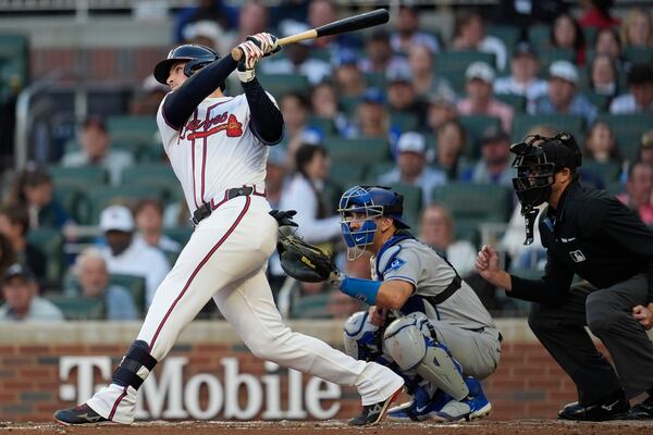 Atlanta Braves' Austin Riley (27) hits a two-run homer against the Los Angeles Dodgers in the third inning of a baseball game, Sunday, May 4, 2025, in Atlanta. (AP Photo/Mike Stewart)