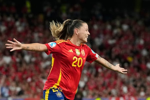 Spain's Claudia Pina celebrates after scoring her side's second goal during the Women's Euro 2025 quarterfinals soccer match between Spain and Switzerland at Stadion Wankdorf in Bern, Switzerland, Friday, July 18, 2025. (AP Photo/Alessandra Tarantino)