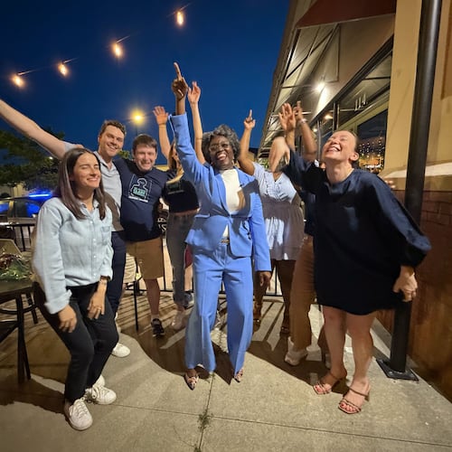 State Rep. Jasmine Clark and staff react to news that she is the likely winner on the Democratic ticket for U.S. House District 13 at her election night watch party at Fresca Trattoria in Stone Mountain on Tuesday, May 19, 2026. (Gavin Godfrey/AJC)