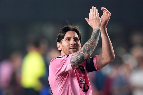 Inter Miami forward Lionel Messi salutes fans at the end of an MLS soccer match against Philadelphia Union, Saturday, March 29, 2025, in Fort Lauderdale, Fla. (AP Photo/Rebecca Blackwell)