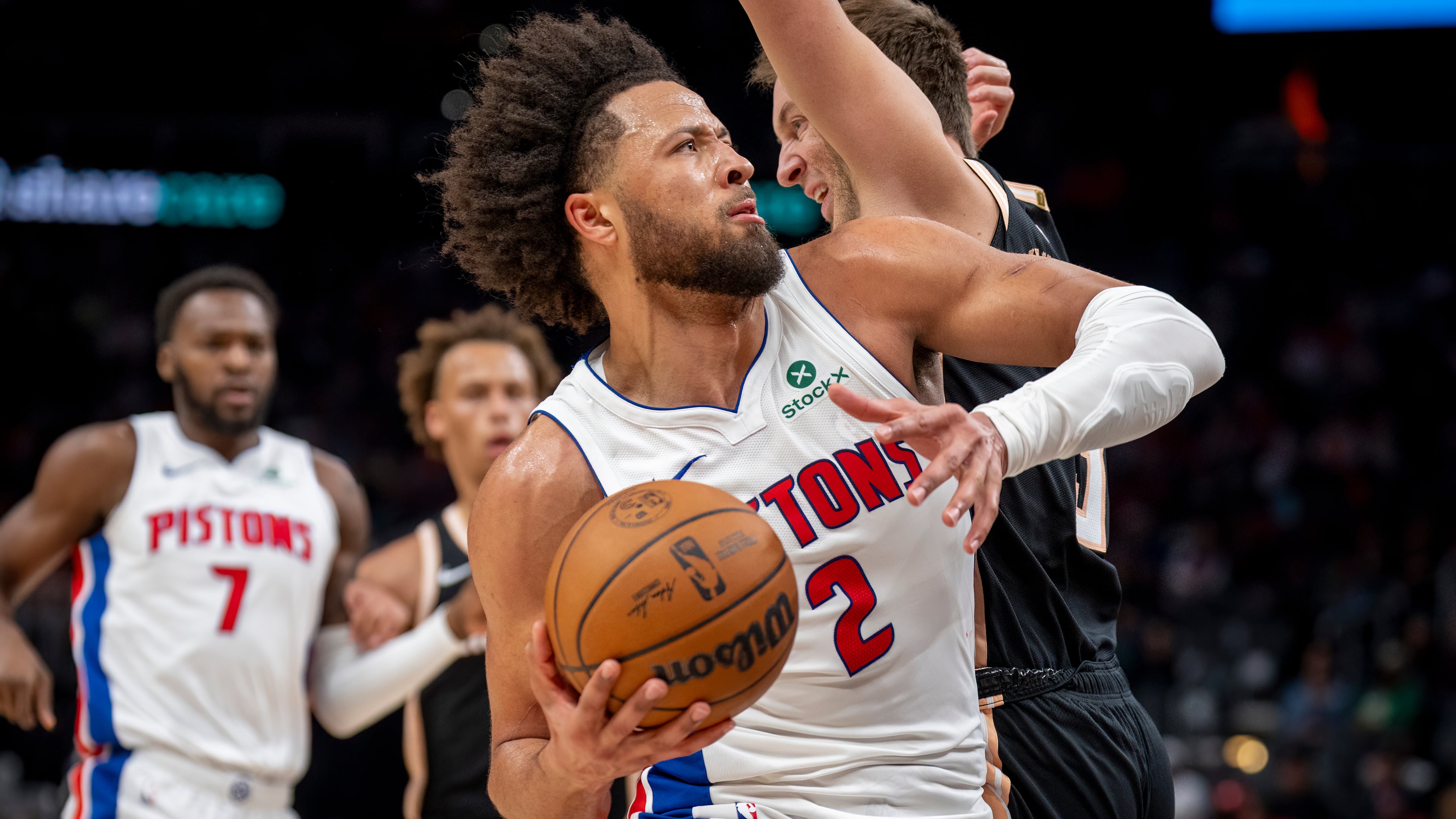 Detroit guard Cade Cunningham was one of eight Pistons in double figures with 15 points in a 142-115 win over the Atlanta Hawks. Jalen Johnson had his third straight triple-double for the Hawks in a losing effort. (Erik Rank/AP)