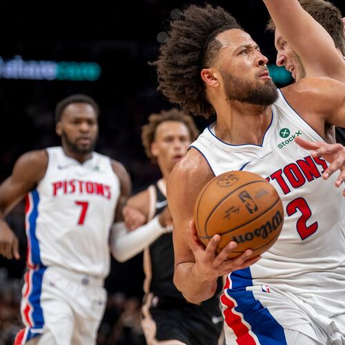 Detroit guard Cade Cunningham was one of eight Pistons in double figures with 15 points in a 142-115 win over the Atlanta Hawks. Jalen Johnson had his third straight triple-double for the Hawks in a losing effort. (Erik Rank/AP)