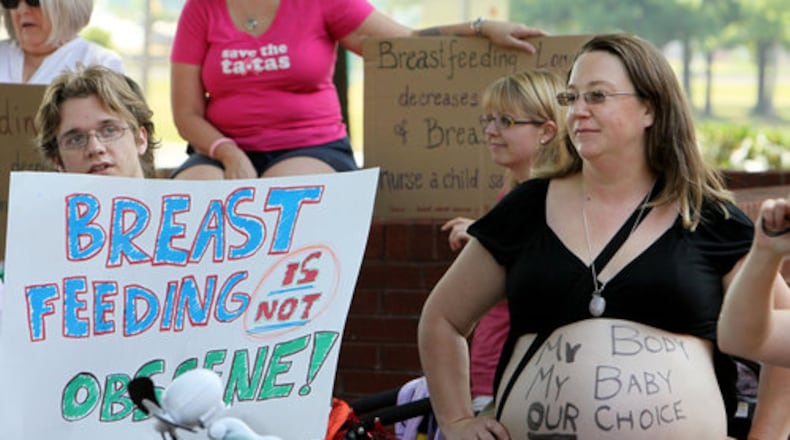 The current infant formula shortage has led to the chastising of women who do not breastfeed. Yet, women who do breastfeed have also been publicly shamed. Pictured are "Lactivists" who gathered in May 2011 in front of Forest Park City Hall to protest a law prohibiting breastfeeding children older than two in public. AJC FILES