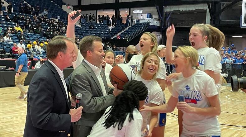 Coach Ed Wilson and the Lake Oconee Academy players celebrate their 45-29 victory over Hancock Central in the Class A Public championship game on Wednesday, March 9, 2022, at the Macon Coliseum.