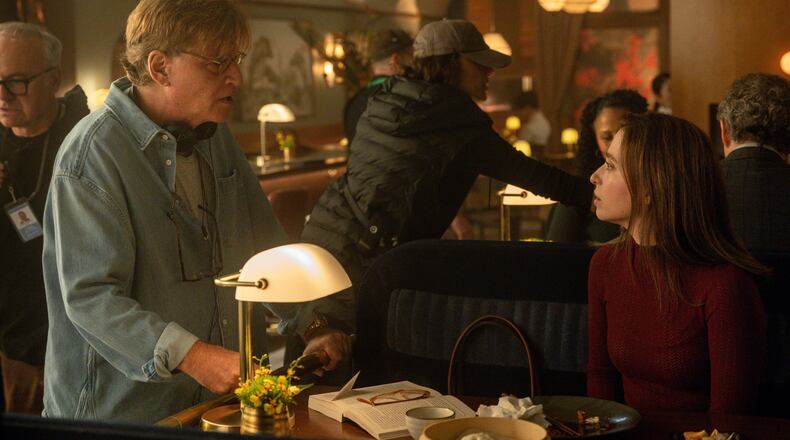 This image released by Sony Pictures shows writer-director Aaron Sorkin, left, with actor Mikey Madison on the set of “The Social Reckoning.” (Leah Gallo/Sony Pictures via AP)