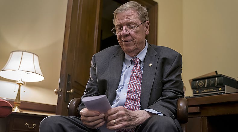 U.S. Sen. Johnny Isakson, R-Ga., meets with his staff in his Capitol Hill office on Dec. 2, 2019, as he prepares to deliver his farewell address on the floor of the Senate. (AP Photo/J. Scott Applewhite)