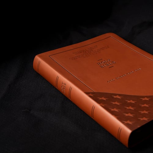 FILE - The front cover of Republican presidential nominee former President Donald Trump's "God Bless the USA" Bible in Washington, Oct. 8, 2024. (AP Photo/Ben Curtis, File)