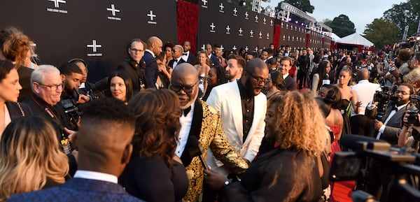 Major celebrities, including Oprah Winfrey, T.D. Jakes, Dallas Austin, Kelly Rowland and Tyler Perry himself, attend the opening of Tyler Perry Studios.. (AJC 2019)