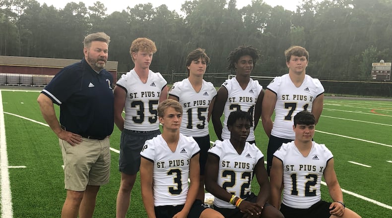 The 2021 St. Pius football team has 27 returning seniors for first-year coach Chad Garrison. The Golden Lions were photographed at the DeKalb County Media Day at Tucker High School.