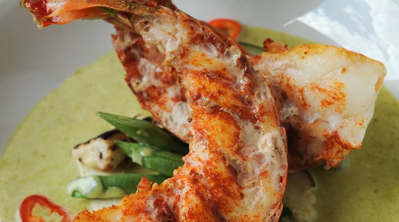 Battered Maine lobster with Thai eggplant, Chinese eggplant, green beans, and basil served in green curry sauce. (BECKY STEIN PHOTOGRAPHY)