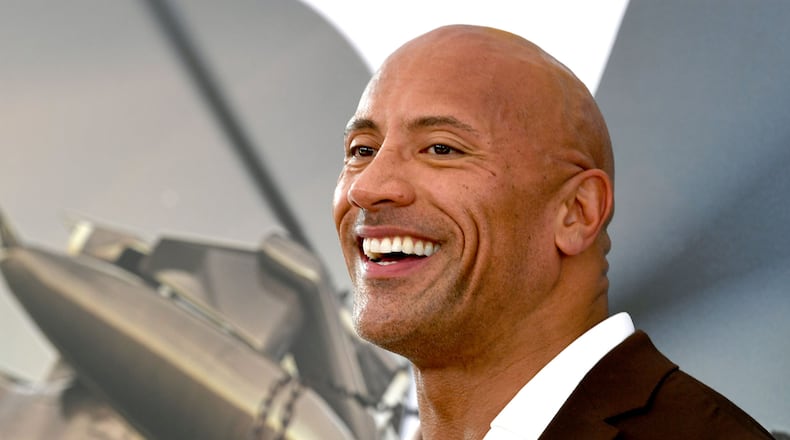 Actor Dwayne Johnson met with the Apalachee High School football team last week while filming a movie in Atlanta, according to his Instagram on Saturday. (Kevin Winter/Getty Images/TNS)