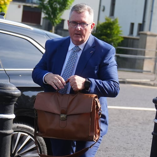 Jeffrey Donaldson arrives at Newry Crown Court, England, where he and his wife Eleanor Donaldson are accused of historical sexual offences, on Wednesday May 27, 2026. (Brian Lawless/PA via AP)