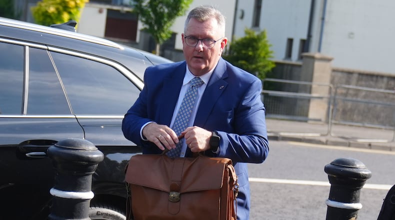 Jeffrey Donaldson arrives at Newry Crown Court, England, where he and his wife Eleanor Donaldson are accused of historical sexual offences, on Wednesday May 27, 2026. (Brian Lawless/PA via AP)