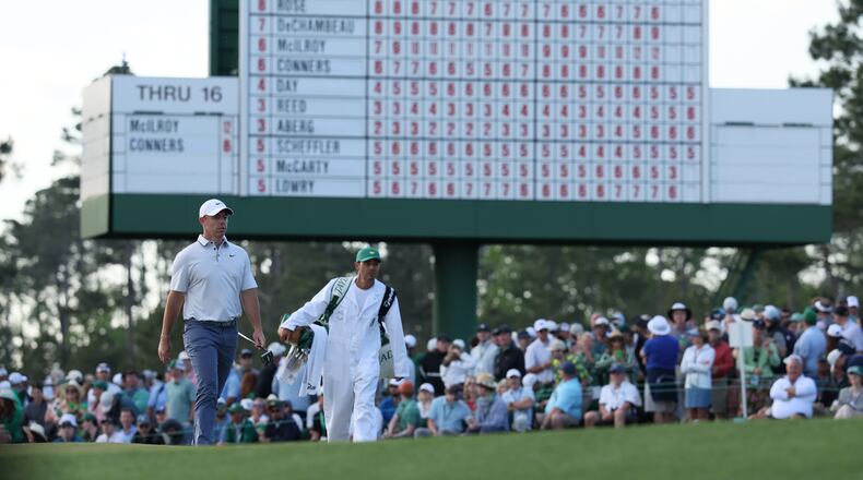 Rory McIlroy and caddie Harry Diamond walk to 17th tee with the lead during third round of the Masters golf tournament, at Augusta National Golf Club, Saturday, April 12, 2025, in Augusta, Ga. (Jason Getz / AJC)