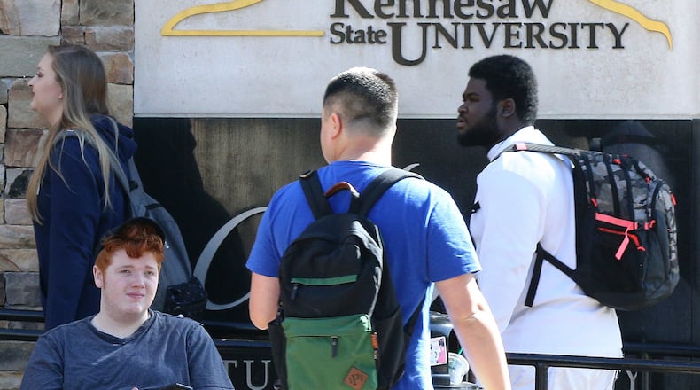 Students make their way across campus at the commons area of Kennesaw State University on Thursday, Oct. 12, 2017, in Kennesaw. Curtis Compton/ccompton@ajc.com