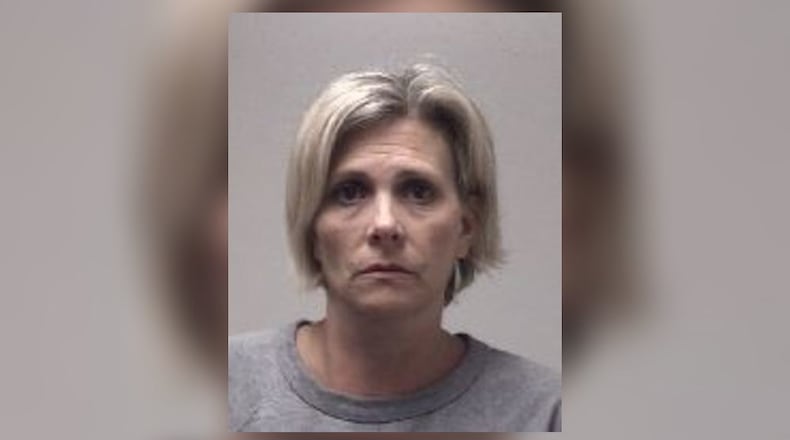 Cheryl Howell Coe, 51, faces a murder charge after shooting her husband in the couple's Coweta County home, authorities said.
