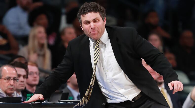 Georgia Tech head coach Josh Pastner bangs on the scorers table trying to get his team's attention during a 78-74 loss to Notre Dame Wednesday, Jan. 15, 2020, at McCamish Pavilion in Atlanta.