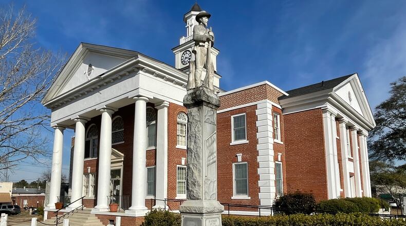 A statue of a Confederate soldier with the inscription "Our Heroes" stands in front of the Taylor County Courthouse in the middle Georgia city of Butler.