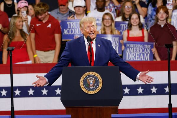 President Donald Trump was at Wheeler High School in Marietta last month to promote his new savings program. (Arvin Temkar/AJC)
