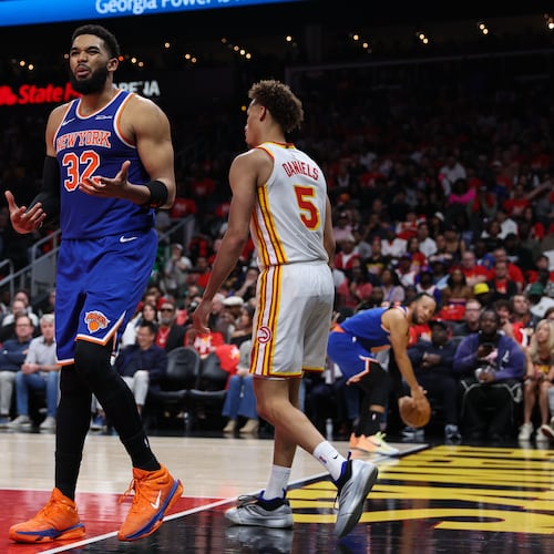 New York Knicks center Karl-Anthony Towns (32) reacts during the first half in Game 3 of a first-round NBA playoffs basketball series against the Atlanta Hawks, Thursday, April 23, 2026, in Atlanta. (AP Photo/Colin Hubbard)