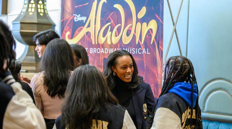 Part of the cast of Aladdin and Spelman College graduate, Taylor Mackenzie Smith, answers a question from a Ron Clark Atlanta student during a panel discussion with the cast of Disney on Broadway’s “Aladdin” at the Fox Theatre in Atlanta, GA on Thursday, January 11, 2024. (Jamie Spaar for the Atlanta Journal Constitution)